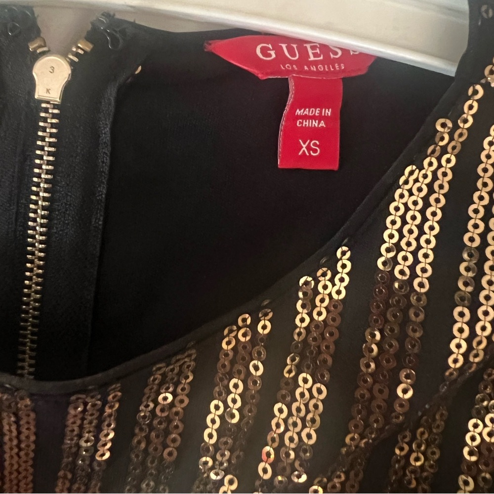 Gold and black short guess  dress just used once